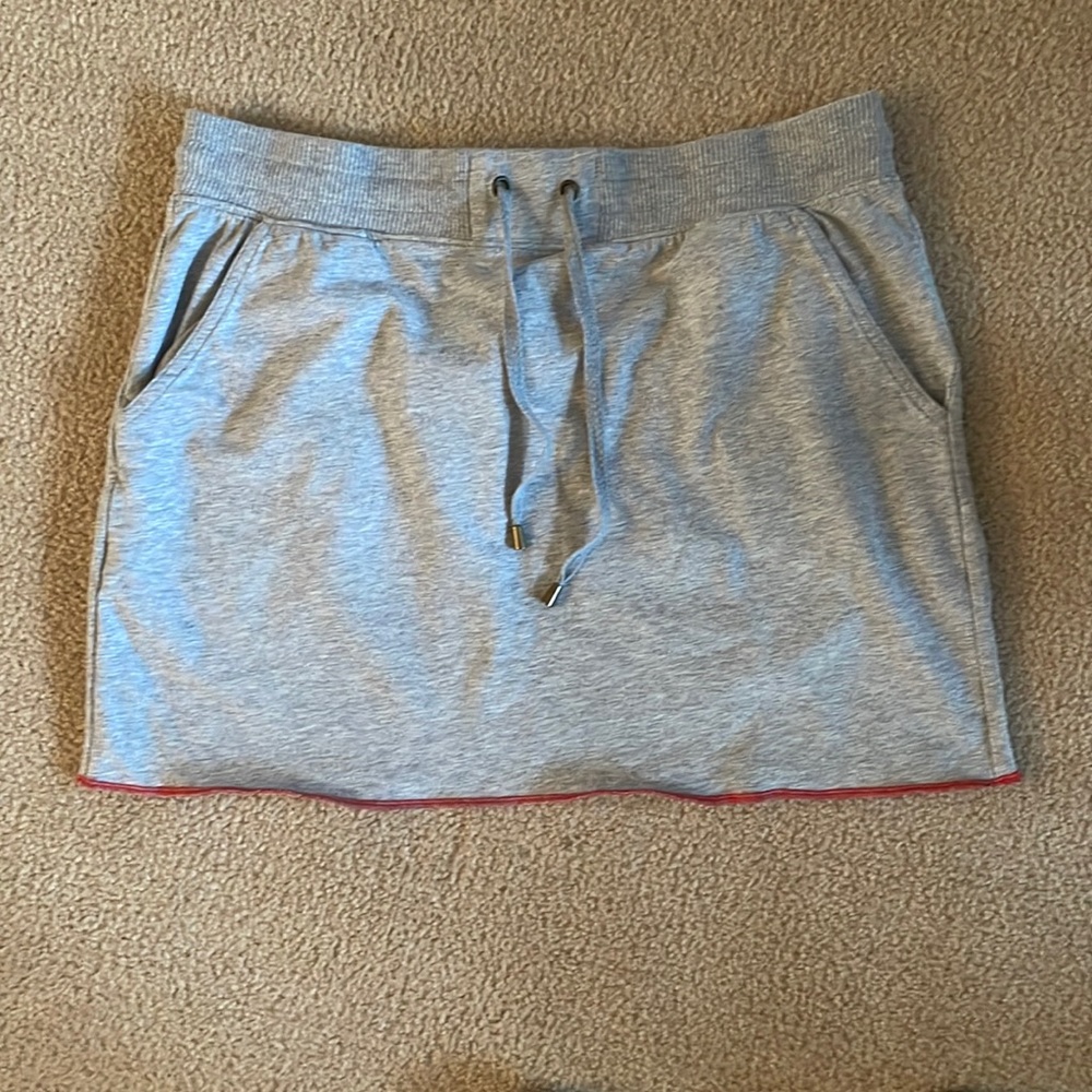 Grey skirt with red stitching